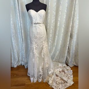 Strapless lace wedding gown with belt